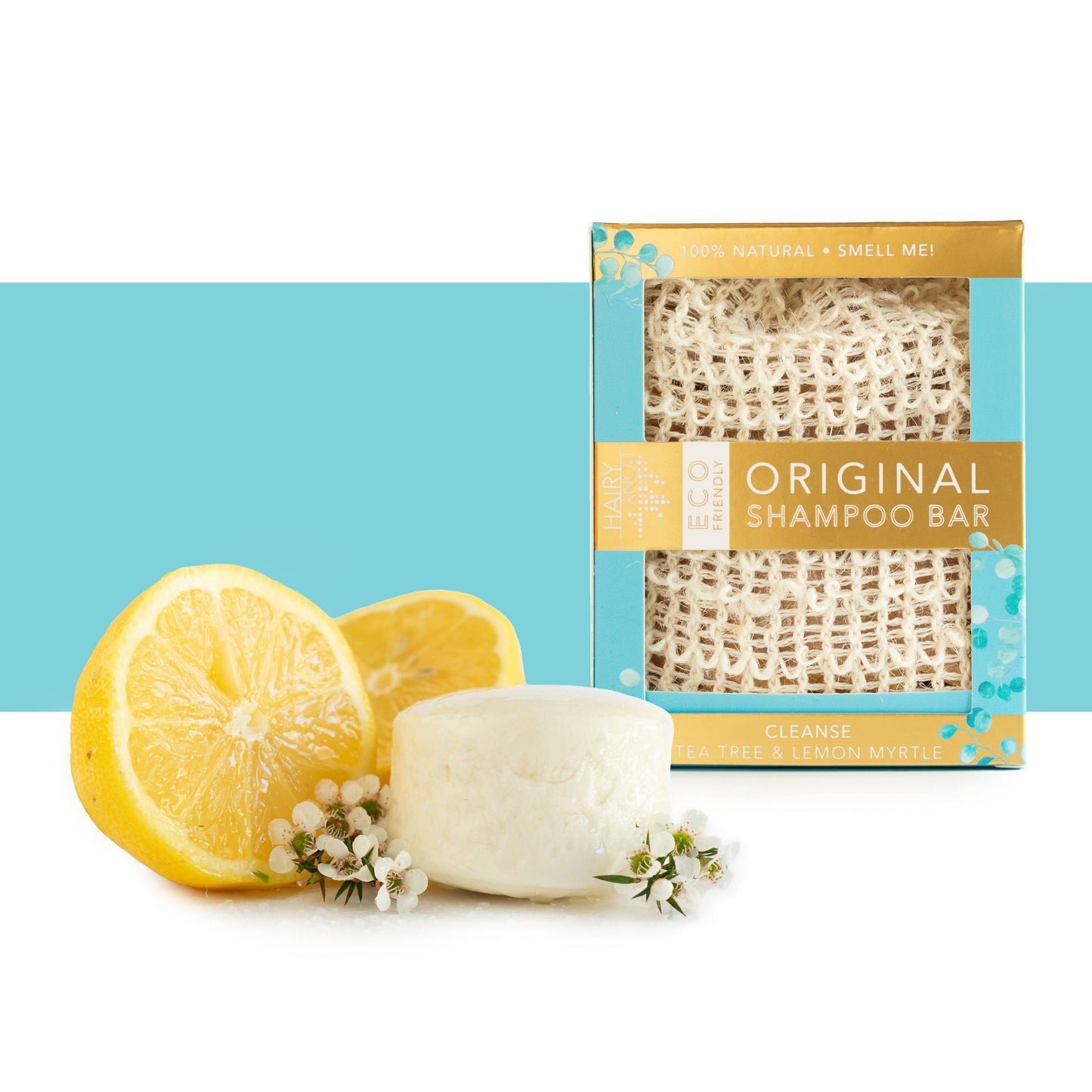 The Hairy Pony Cleanse Shampoo Bar in its packaging, with lemon & florals alongside the bars