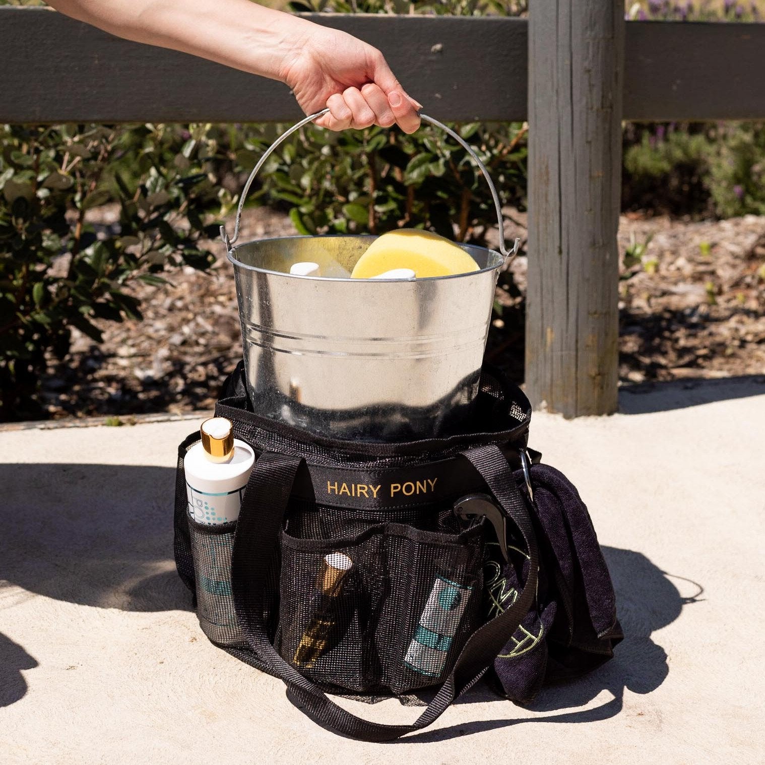 Horse Wash Bay Bag with a bucket inside it